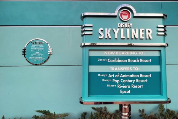 Disney Skyliner sign showing routes to Epcot, Hollywood Studios, and resorts