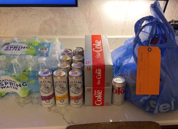 Drinks and sodas including Coke, Diet Coke, and natural spring water
