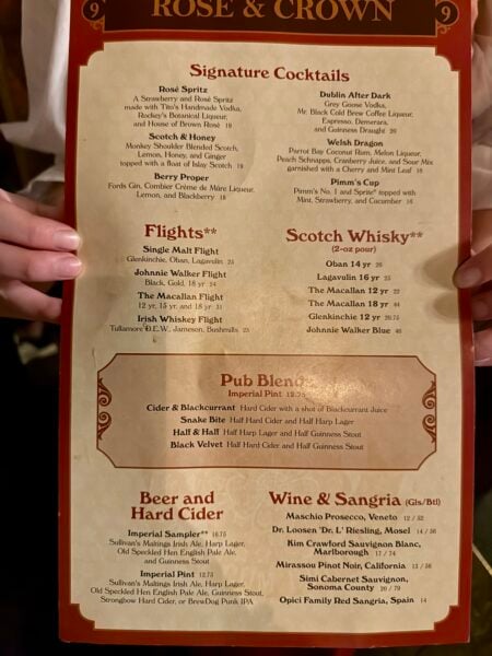 Rose & Crown drink menu listing the Pimm's Cup at $16 with signature cocktails, flights, and pub blends