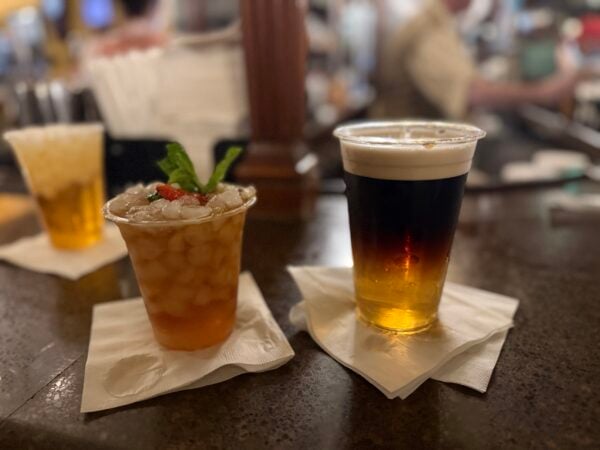 Pimm's Cup next to a Half & Half of Harp Lager and Guinness on the Rose & Crown Pub bar