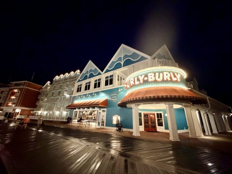 Hurly-Burly marquee lit up at night on Disney's BoardWalk