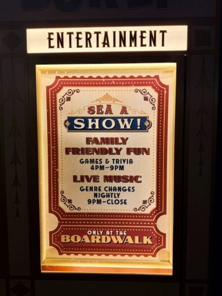 Hurly-Burly entertainment sign: family-friendly games and trivia 4 PM to 9 PM, live music 9 PM to close