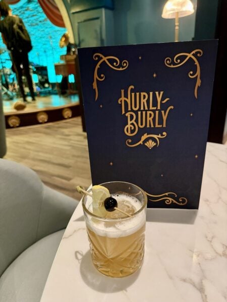 Overproof Amaretto Sour with a lemon and cherry pick at Hurly-Burly
