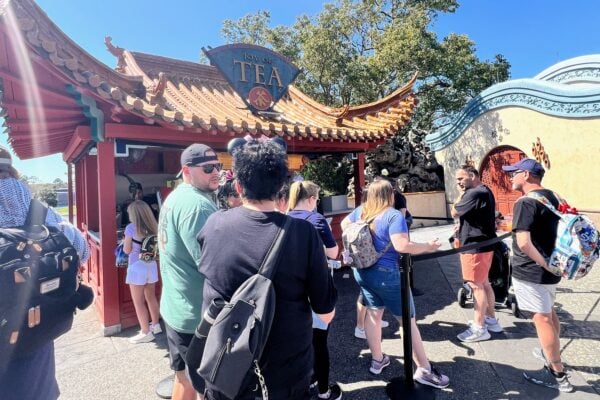 Guests lined up at the Joy of Tea walk-up stand in the China pavilion at EPCOT