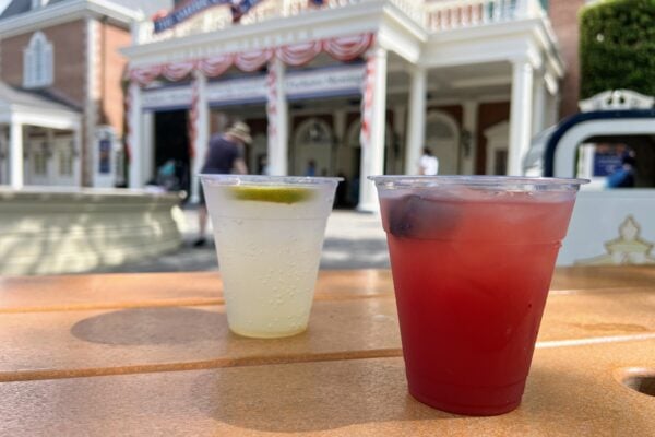 Moonshine Sour and Tennessee Lemonade from the Regal Eagle Outdoor Bar on a table at EPCOT
